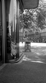 Street by building in city