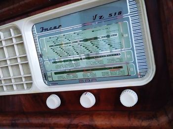 High angle view of information sign on table