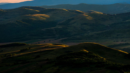 Tranquil rural scene with green hills