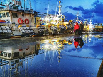 Reflection of buildings in puddle