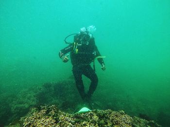 Person swimming in sea