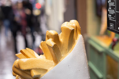  model of traditional french fries on a street in the city center.
