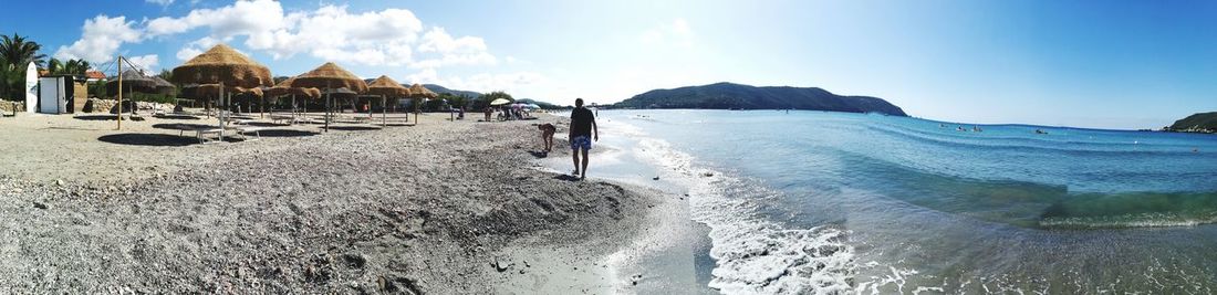 Panoramic view of beach against sky