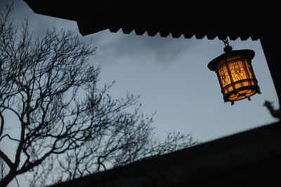 Low angle view of street light against sky