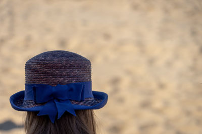 Rear view of woman wearing hat