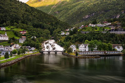 River amidst buildings in town