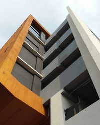 Low angle view of modern building against sky