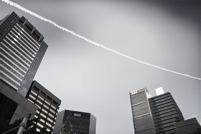 Low angle view of skyscrapers against sky