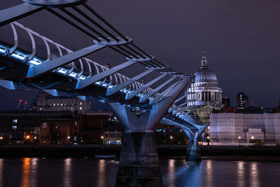 St paul's cathedral and millennium bridge over the river thames in london