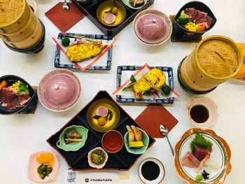 High angle view of sushi served on table
