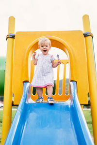 Cute girl playing in playground