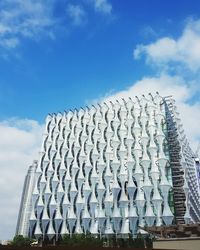 Low angle view of new usa embassy in london uk against cloudy sky