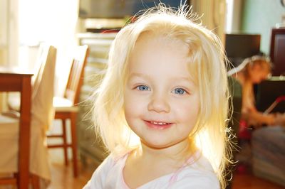 Portrait of cute girl at home