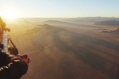 Man on landscape against sky