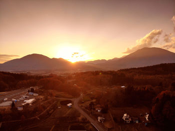 High angle view of city during sunset