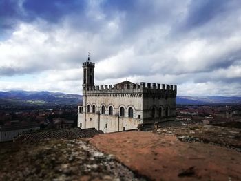 View of historic building against cloudy sky