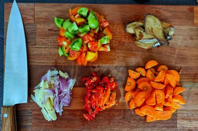 High angle view of chopped vegetables on cutting board
