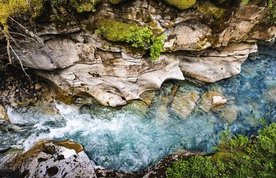 Scenic view of rock formation in water