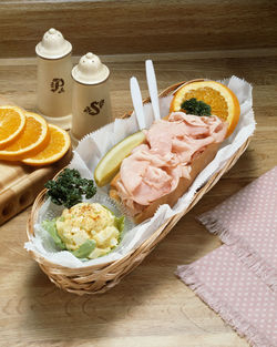 High angle view of fruits in plate on table