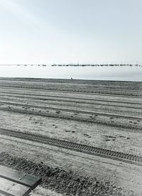 Scenic view of beach against clear sky