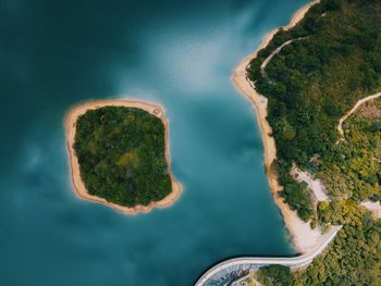 High angle view of rocks by sea