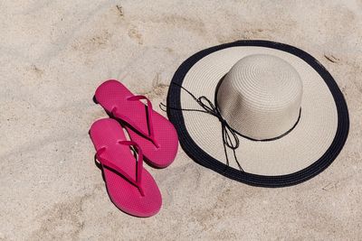 High angle view of shoes on sand