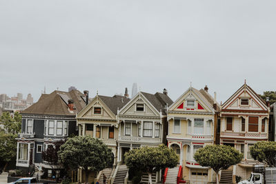 View of residential buildings against sky