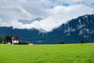 Beautiful mountains landscape in switzerland alps. small house