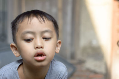 Portrait of cute boy at home