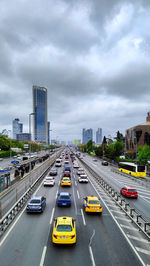 High angle view of traffic on road in city against sky