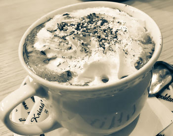 Close-up of coffee cup on table