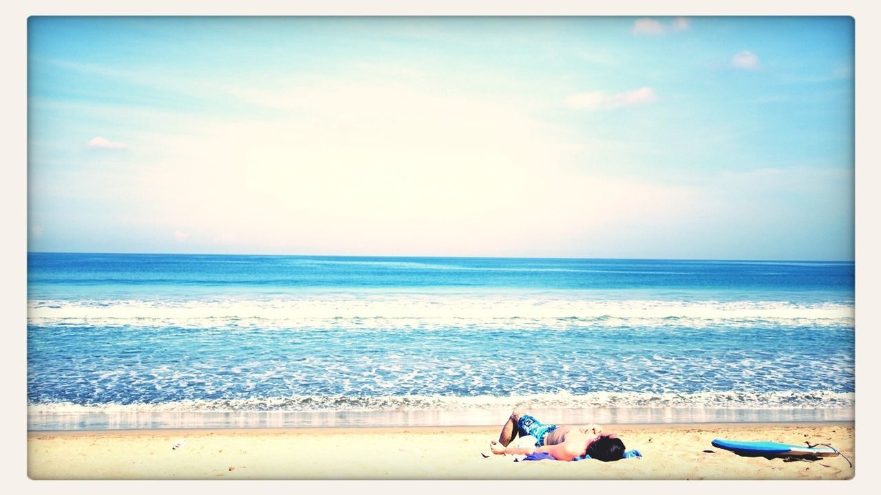 sea, horizon over water, beach, water, sky, shore, sand, scenics, transfer print, vacations, tranquil scene, beauty in nature, tranquility, leisure activity, lifestyles, auto post production filter, nature, cloud - sky, blue