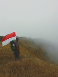 Scenic view of landscape in foggy weather