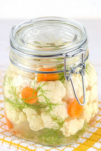 Close-up of food in glass against white background