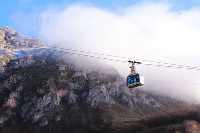  cable car with foggy morning at fuente dé , picos de europa, cantabria, spain. photo