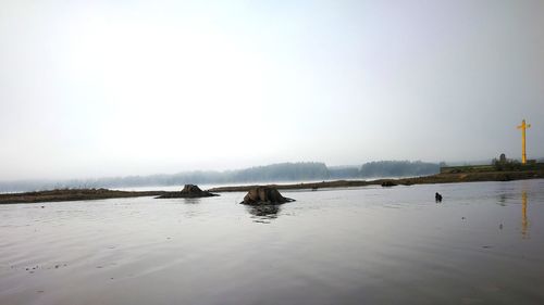 Scenic view of sea against clear sky