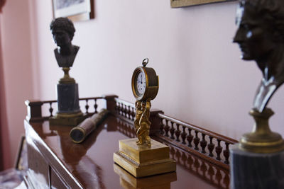 Close-up of sculpture on table at home