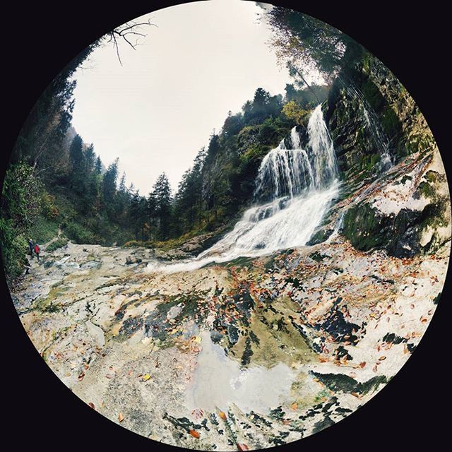 water, rock - object, motion, fish-eye lens, flowing water, nature, waterfall, rock formation, scenics, sky, long exposure, beauty in nature, tree, circle, day, non-urban scene, no people, outdoors, flowing, rock