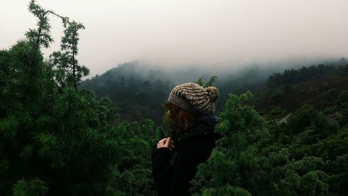 Scenic view of mountains in foggy weather