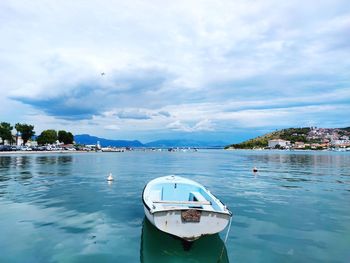 Boat in sea against sky