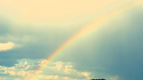 Low angle view of rainbow against sky