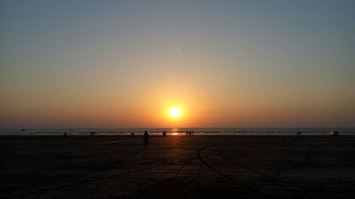 Scenic view of sea at sunset