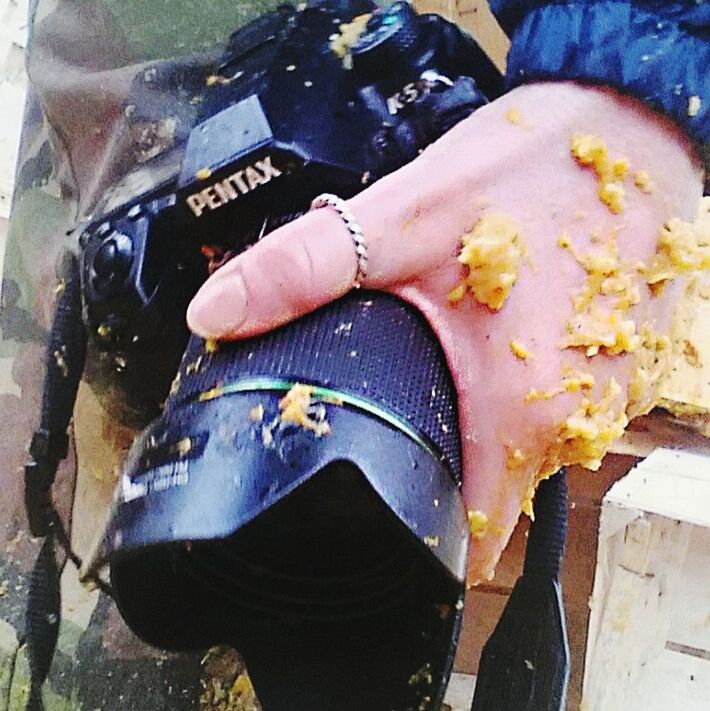 CLOSE-UP OF WOMAN HOLDING ICE CREAM