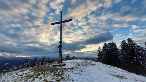 Scenic view of snow covered mountain against sky