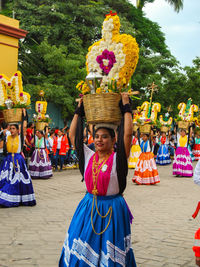 High angle view of people dancing in traditional clothing