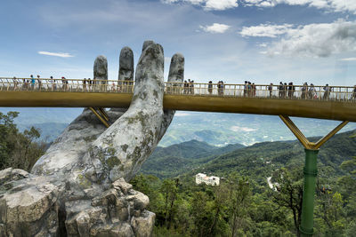 Scenic view of mountain against cloudy sky