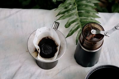 High angle view of coffee cup on table