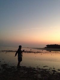 Scenic view of sea at sunset