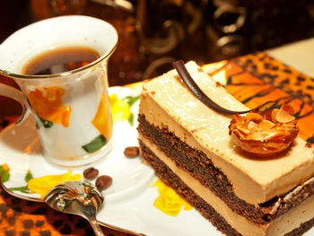 Close-up of cake and drink in plate