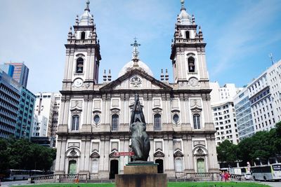 Low angle view of statue of building against sky